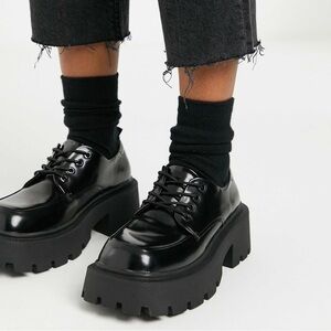 Truffle Collection chunky lace up shoes with exaggerated sole in black